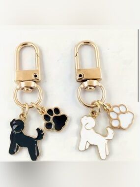 White or Black with Gold Dog and Paw Keychain or Bag Charm. Brand new.